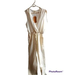 Andree by unit jumpsuit NWT cream and white striped Med